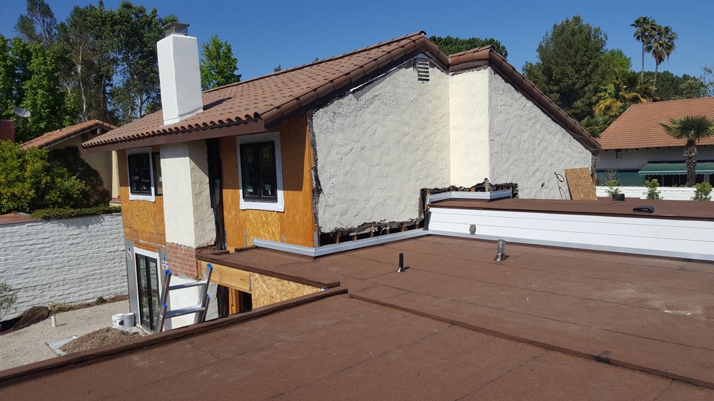 Slide of CJ West Roofing