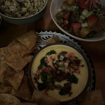 Arriba Abajo - Left to right: Esquites, Queso, Panela Panzanella - Mexican Near Me - Austin, Texas Arriba Abajo - Left to right: Esquites, Queso, Panela Panzanella - Mexican Near Me - Austin, Texas