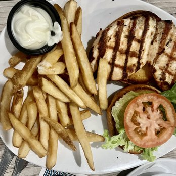 Dockside Waterfront Grill - Grilled chicken sandwich and fries - Seafood Near Me - Venice, Florida Dockside Waterfront Grill - Grilled chicken sandwich and fries - Seafood Near Me - Venice, Florida