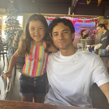 Nalu's South Shore Grill - My son, Brandon, with our lil sidekick, Aliya. It's the first restaurant we took him to from the airport! - Hawaiian Near Me - Kihei, Hawaii