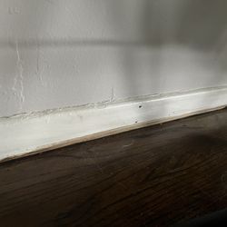 Carlton Apartments - After maintenance painted over the stain on the trim