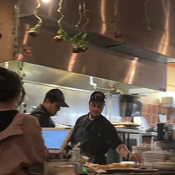 Nonna's Trattoria - Chefs cooking up pasta - Italian Near Me - St Augustine, Florida