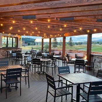 The Refinery - a patio with tables and chairs - Breakfast & Brunch Near Me - Casper, Wyoming