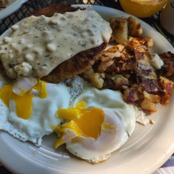 Franklin's Hoagies - Chicken fried steak with sausage gravy, basted eggs, and home fried potatoes. The yolks were PERFECT! - Sandwiches Near Me - Coeur D Alene, Idaho