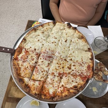 The Works Pizza - Large Half and Half alfredo and marinara cheese pizza - Pizza Near Me - Covington, Kentucky The Works Pizza - Large Half and Half alfredo and marinara cheese pizza - Pizza Near Me - Covington, Kentucky