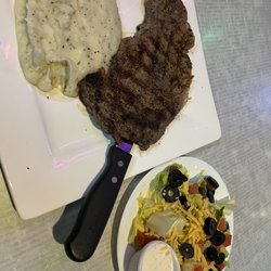 Generations Sports Bar & Grill - Ribeye Steak with mashed potatoes and a side salad