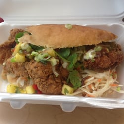 Sharr-Keys Gourmet - Bake and Shark with coleslaw , pineapples, mango, and tamarind dressings!