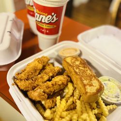 Raising Cane's Chicken Fingers - Caniac Combo- 6 tenders, fries, cane sauce, texas toast, coleslaw and half n half
