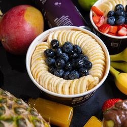 Acai Republic - Strawberries, bananas, blueberries, cut fresh this morning on Main St.