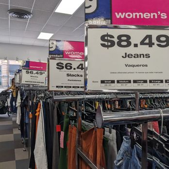 Goodwill - Racks of women's clothes with pricing - Thrift Stores Near Me - Arlington, Virginia