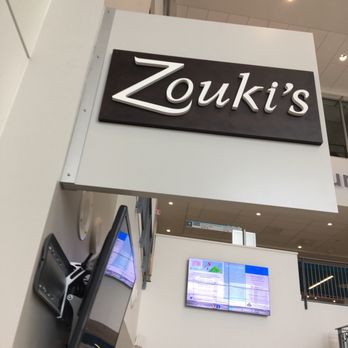 Zouki's - a large sign in a mall - Lebanese Near Me - Montreal, Quebec