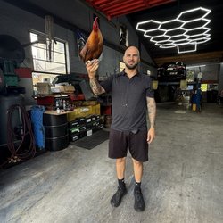 Rey's Auto Repair - Steven & Cocky (Pet Rooster) at the shop