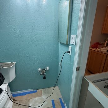 Montuys Floors And Construction - Painting after troughing the wall to cover the old lines from striped paint. - General Contractors Near Me Montuys Floors And Construction - Painting after troughing the wall to cover the old lines from striped paint. - General Contractors Near Me