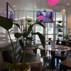 Motoneko Cafe - Beautiful lobby and seating area with ambient lighting!
