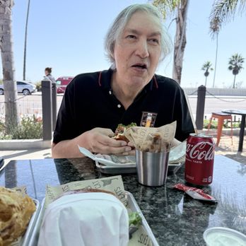 Happy Cat Eats - This is my step brother enjoying his soft buns and tasty burgers with his fries - Burgers Near Me - Santa Barbara, California Happy Cat Eats - This is my step brother enjoying his soft buns and tasty burgers with his fries - Burgers Near Me - Santa Barbara, California