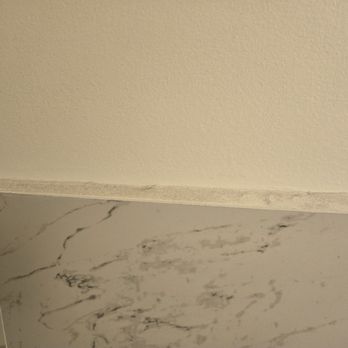 Burma 2 - Inside bathroom. Wall tile edge. Not clean at all. Tells you all there is to know about management and owners of the business. - Burmese Near Me - Walnut Creek, California