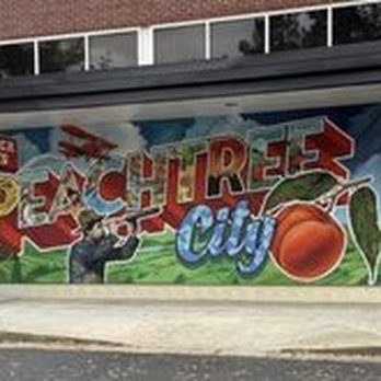 Trader Joe's - the beautiful mural they painted after adding their cart coral and awning - Grocery Near Me - Peachtree City, Georgia Trader Joe's - the beautiful mural they painted after adding their cart coral and awning - Grocery Near Me - Peachtree City, Georgia