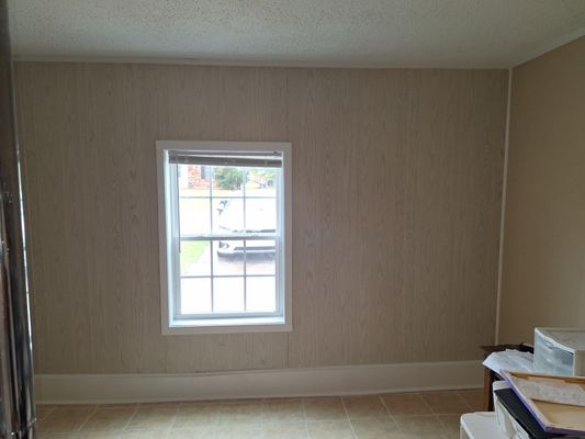 Water damage repair, window installation w/new paneling. - Water damage repair, window installation with new paneling, trim and baseboard.
