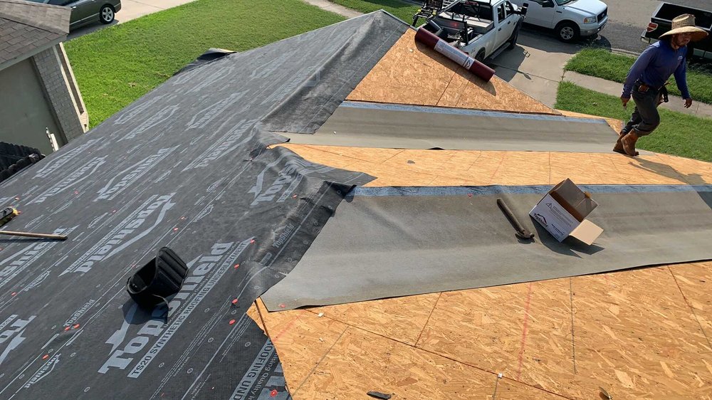 Slide of Top Notch Roofing