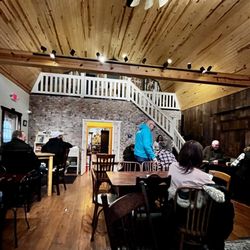 The Mockingbird - Main seating area, with live music by the stairs
