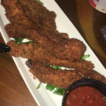 Quarterdeck Restaurants - Parma Sean crusted chicken tenders. Served with marinara sauce.... I ordered buffalo and ranch to dip it in instead. - American Near Me - Davie, Florida