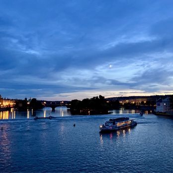 Karlův Most - View from the bridge - a low hanging slice of moon in the distance - Landmarks & Historical Buildings Near Me - Prague, Puerto Rico