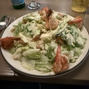 Madri - Caesar salad on hot plate that warmed the lettuce and broke down the dressing. - Italian Near Me - Redlands, California Madri - Caesar salad on hot plate that warmed the lettuce and broke down the dressing. - Italian Near Me - Redlands, California