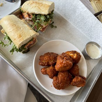 Turn Restaurant - Salmon sandwich and Buffalo cauliflower - Breakfast & Brunch Near Me - St. Louis, Missouri Turn Restaurant - Salmon sandwich and Buffalo cauliflower - Breakfast & Brunch Near Me - St. Louis, Missouri