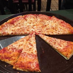 Jendy's Pizzeria - Large hand tossed cheese pizza disappearing fast. Great crust.