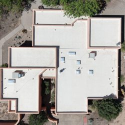 Alvarado Roofing - Tan TPO roof installed in Corrales, NM.