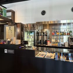 The Wolfsonian Design Store + Cafe - Coffee counter and gift shop register counter