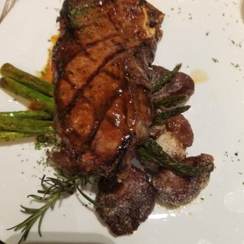 The Old Library Restaurant - Bone in NY strip with crispy potates - Cocktail Bars Near Me - Olean, New York