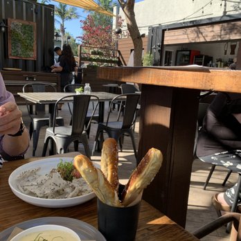 Benchmark - Cute patio seating - New American Near Me - Santa Ana, California