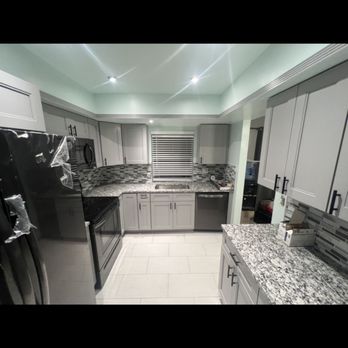 Sophivan Services - a kitchen with stainless steel appliances - Countertop Installation Near Me Sophivan Services - a kitchen with stainless steel appliances - Countertop Installation Near Me