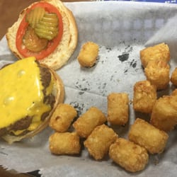 The Zone Sports Bar On Fort Campbell - Double cheeseburger with tator tots. Stop being so stingy with the tots!!!!!