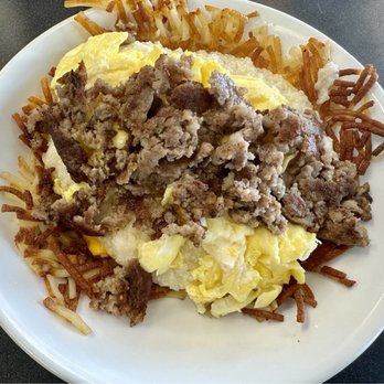 Waffle House - Sausage, egg, and cheese bowl over 1/2 hash browns and 1/2 grits. - Breakfast & Brunch Near Me - Melbourne, Florida