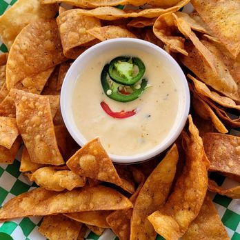Millies Kitchen & Cocktails - Chips & queso - Seafood Near Me - Houston, Texas Millies Kitchen & Cocktails - Chips & queso - Seafood Near Me - Houston, Texas
