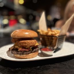 *BBQ BACON ME CRAZY BURGER $22 8or Signature Blend Burger, Cheddar Cheese, Bacon, Onion Ring, BBQ Sauce, Smokey Crèma, Potato Bun *BBQ BACON ME CRAZY BURGER $22 8or Signature Blend Burger, Cheddar Cheese, Bacon, Onion Ring, BBQ Sauce, Smokey Crèma, Potato Bun