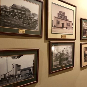 Nick's on 2nd - Historical photos of Eunice hang in the hallway leading to the restrooms. - Seafood Near Me - Eunice, Louisiana