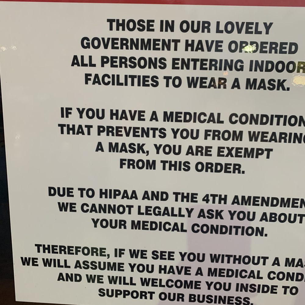 The Outpost - a sign stating customers not to wear masks - Bars Near Me - Sherwood, Wisconsin The Outpost - a sign stating customers not to wear masks - Bars Near Me - Sherwood, Wisconsin