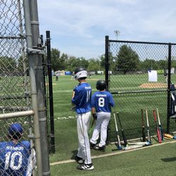 Waters Field - Players near the dugout (May 2022).