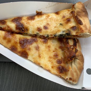 Tony's Villa Rosa - Old pizza cheese pizza cut with a dirty knife that's why the black is on the side. - Italian Near Me - Frankfort, Illinois Tony's Villa Rosa - Old pizza cheese pizza cut with a dirty knife that's why the black is on the side. - Italian Near Me - Frankfort, Illinois