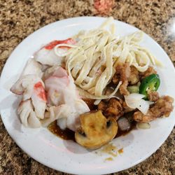Asian Fusion Buffet - Buffet plate of food.