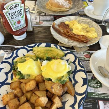 Peconic Diner - Breakfast. Eggs florentine Benedict and peconic pancakes deluxe with eggs and bacon. - Diners Near Me - Riverhead, New York