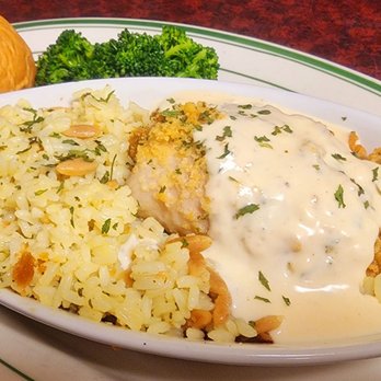 The Bada Bean - a plate of food on a table - Breakfast & Brunch Near Me - Tallahassee, Florida