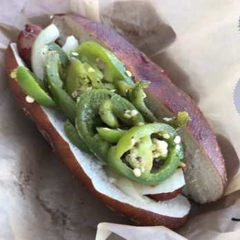 Wursthaus - Bratwurst in pretzel bun with onions and jalapeños. - Pubs Near Me - Santa Ana, California Wursthaus - Bratwurst in pretzel bun with onions and jalapeños. - Pubs Near Me - Santa Ana, California