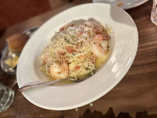 Photo of Felice 56 - New York, NY, US. a plate of pasta with shrimp and cheese