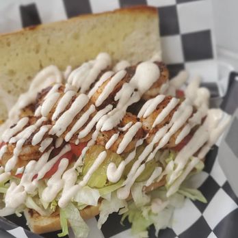 Any 'Wich Way - Blackened Shrimp Po'Boy  Blackened shrimp, lettuce, tomato, pickles, and our housemade remoulade sauce on French bread - Food Trucks Near Me