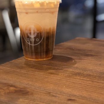 Zero Degrees - Thai tea. The drizzle is condensed milk. - Coffee & Tea Near Me - Houston, Texas Zero Degrees - Thai tea. The drizzle is condensed milk. - Coffee & Tea Near Me - Houston, Texas