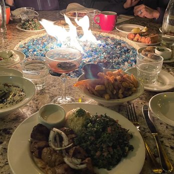 Zaytoon - Outside table with Lamb kebab, chicken kebab, hummus, labne, etc. - Lebanese Near Me - Santa Barbara, California Zaytoon - Outside table with Lamb kebab, chicken kebab, hummus, labne, etc. - Lebanese Near Me - Santa Barbara, California